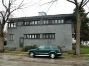 2732-2734 W BURNHAM ST, a Prairie School duplex/two-flat, built in Milwaukee, Wisconsin in 1915.