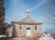 1926 COUNTY HIGHWAY DK, a Neoclassical/Beaux Arts one to six room school, built in Brussels, Wisconsin in 1910.