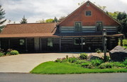 N2610 LOG CABIN DR, a Front Gabled boarding house, built in Wolf River, Wisconsin in 1874.