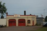 329 FRONT ST, a Commercial Vernacular gas station/service station, built in Minocqua, Wisconsin in 1931.