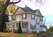 116 S LYNN ST, a American Foursquare house, built in Stoughton, Wisconsin in 1915.