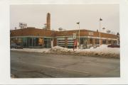 716 E DIVISION AVE, a Art/Streamline Moderne automobile showroom, built in Barron, Wisconsin in 1950.