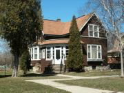 332-334 S CHESTNUT AVE, a Queen Anne duplex/two-flat, built in Green Bay, Wisconsin in 1891.