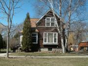 332-334 S CHESTNUT AVE, a Queen Anne duplex/two-flat, built in Green Bay, Wisconsin in 1891.