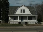 1620 MAIN ST, a Dutch Colonial Revival house, built in Green Bay, Wisconsin in 1904.