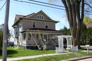 505 MAIN ST, a American Foursquare house, built in Wrightstown, Wisconsin in 1916.