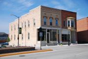 301 W MAIN AVE, a Commercial Vernacular small retail building, built in De Pere, Wisconsin in 1887.
