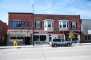 313 MAIN AVE, a Commercial Vernacular small retail building, built in De Pere, Wisconsin in 1912.