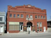 136 E MAIN ST, a Romanesque Revival opera house/concert hall, built in Weyauwega, Wisconsin in 1915.