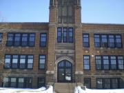 1105 MAIN ST, a Late Gothic Revival elementary, middle, jr.high, or high, built in Eau Claire, Wisconsin in 1916.