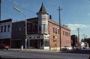 105-111 E MAIN ST, a Queen Anne tavern/bar, built in Stoughton, Wisconsin in 1903.