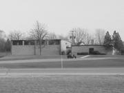 619 W. Wisconsin Ave. 619 W. Wisconsin Ave., a Astylistic Utilitarian Building military building, built in Pewaukee, Wisconsin in 1960.