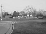 619 W. Wisconsin Ave. 619 W. Wisconsin Ave., a Astylistic Utilitarian Building military building, built in Pewaukee, Wisconsin in 1960.