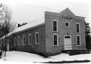 STATE HIGHWAY 27, 7 M N OF CADOTT, a Boomtown meeting hall, built in Arthur, Wisconsin in 1907.