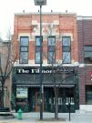 217 N WASHINGTON ST, a Commercial Vernacular small retail building, built in Green Bay, Wisconsin in 1882.