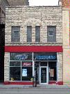 225 E WALNUT ST, a Commercial Vernacular small retail building, built in Green Bay, Wisconsin in 1901.