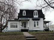 433-435 S VAN BUREN ST, a Second Empire house, built in Green Bay, Wisconsin in 1850.