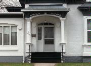433-435 S VAN BUREN ST, a Second Empire house, built in Green Bay, Wisconsin in 1850.