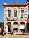 101 4TH ST, a Italianate small retail building, built in Baraboo, Wisconsin in 1877.