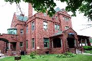 623 BROADWAY, a Romanesque Revival house, built in Baraboo, Wisconsin in 1906.