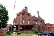 623 BROADWAY, a Romanesque Revival house, built in Baraboo, Wisconsin in 1906.