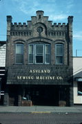 411 W 2ND ST, a Romanesque Revival small retail building, built in Ashland, Wisconsin in 1911.
