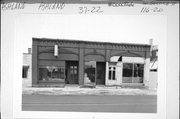 116-20 W 2ND ST (aka MAIN ST W), a Romanesque Revival small retail building, built in Ashland, Wisconsin in 1891.