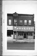 412-414 W 2ND ST, a Italianate small retail building, built in Ashland, Wisconsin in 1897.