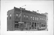 111-21 E BENNETT AVE, a Commercial Vernacular small retail building, built in Mellen, Wisconsin in 1907.