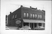 112 E BENNETT AVE, a Commercial Vernacular small retail building, built in Mellen, Wisconsin in 1907.