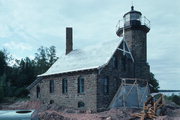 NE TIP SAND ISLAND, a Early Gothic Revival lifesaving station facility/lighthouse, built in Bayfield, Wisconsin in 1881.