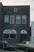 68265 S MAIN ST, a Romanesque Revival bank/financial institution, built in Iron River, Wisconsin in 1907.