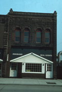 14 E BAYFIELD ST  (USH 13), a Romanesque Revival bank/financial institution, built in Washburn, Wisconsin in 1889.
