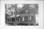 E SIDE OF N/S ST 1, a Gabled Ell house, built in Drummond, Wisconsin in 1890.