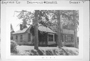 E SIDE OF N/S ST 1, a Gabled Ell house, built in Drummond, Wisconsin in 1890.