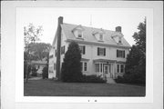 229 E 3RD ST, a Colonial Revival/Georgian Revival house, built in Washburn, Wisconsin in 1916.