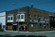 421 GEORGE ST, a Commercial Vernacular automobile showroom, built in De Pere, Wisconsin in 1910.