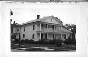 421 CASS ST, a Greek Revival house, built in De Pere, Wisconsin in 1854.