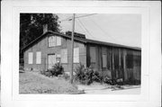 CNR FRONT AND CASS, a Astylistic Utilitarian Building warehouse, built in De Pere, Wisconsin in 1902.