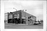 421 GEORGE ST, a Commercial Vernacular automobile showroom, built in De Pere, Wisconsin in 1910.