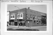 421 GEORGE ST, a Commercial Vernacular automobile showroom, built in De Pere, Wisconsin in 1910.