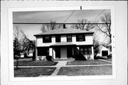 1028-1030 12TH AVE, a Colonial Revival/Georgian Revival duplex/two-flat, built in Green Bay, Wisconsin in 1946.