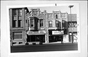 115 N ADAMS ST, a Commercial Vernacular small retail building, built in Green Bay, Wisconsin in 1894.