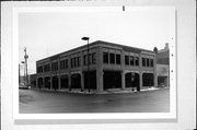 124-130 N ADAMS ST, a Spanish/Mediterranean Styles large retail building, built in Green Bay, Wisconsin in 1928.