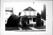 878 HUBBARD ST, a Dutch Colonial Revival house, built in Green Bay, Wisconsin in 1911.