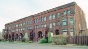 2105-2109 OGDEN AVE AND 1700-1714 N 21ST ST, a Romanesque Revival apartment/condominium, built in Superior, Wisconsin in 1890.