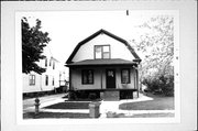 819 OREGON ST, a Dutch Colonial Revival house, built in Green Bay, Wisconsin in 1909.