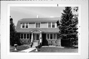 126 S VAN BUREN ST, a Dutch Colonial Revival house, built in Green Bay, Wisconsin in 1921.
