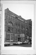 118 - 122 S WASHINGTON ST, a Romanesque Revival large retail building, built in Green Bay, Wisconsin in 1891.