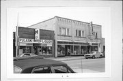 126- 128 W PULASKI ST, a Commercial Vernacular large retail building, built in Pulaski, Wisconsin in 1924.
